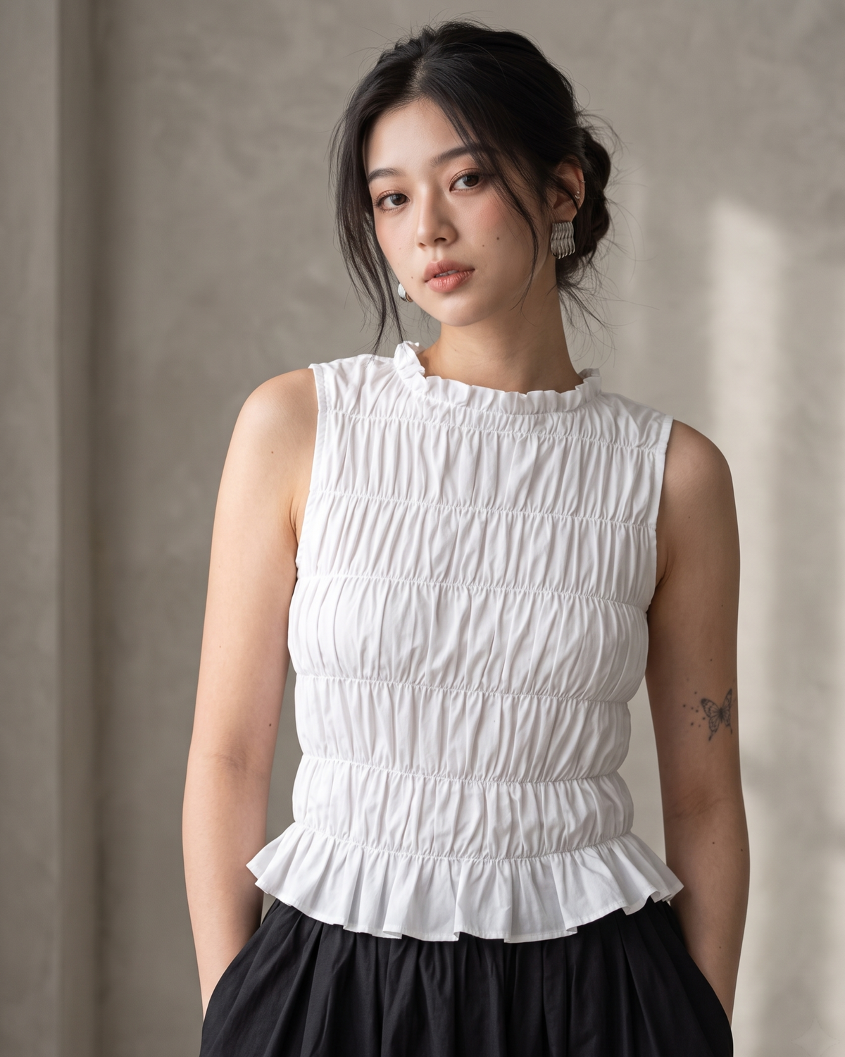 White Ruffle High-Neck Sleeveless Smocked Peplum Top