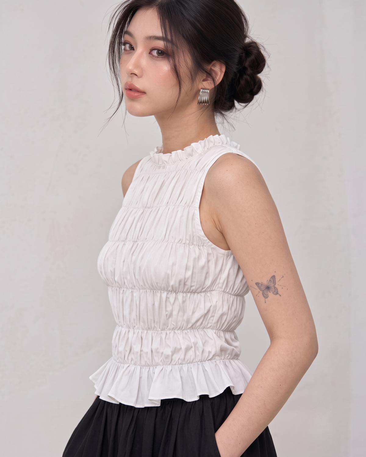 White Ruffle High-Neck Sleeveless Smocked Peplum Top