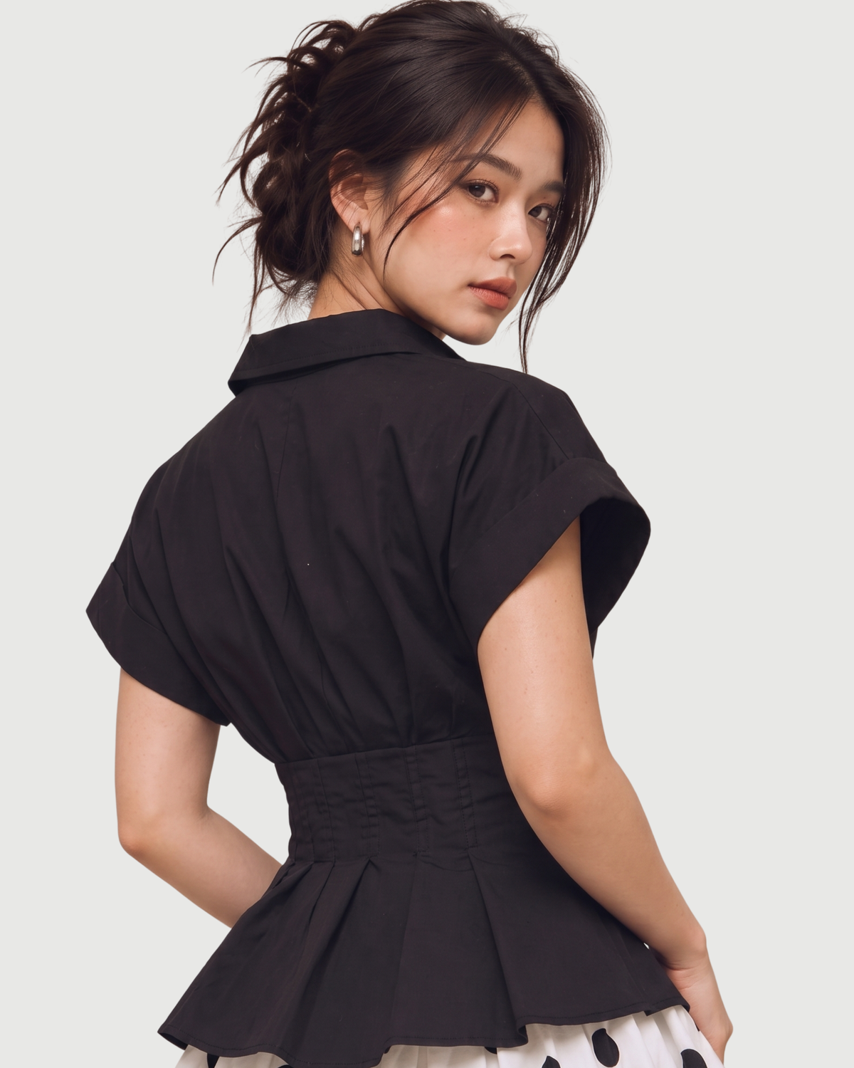 Double-Buckle Belted Peplum Shirt in Black