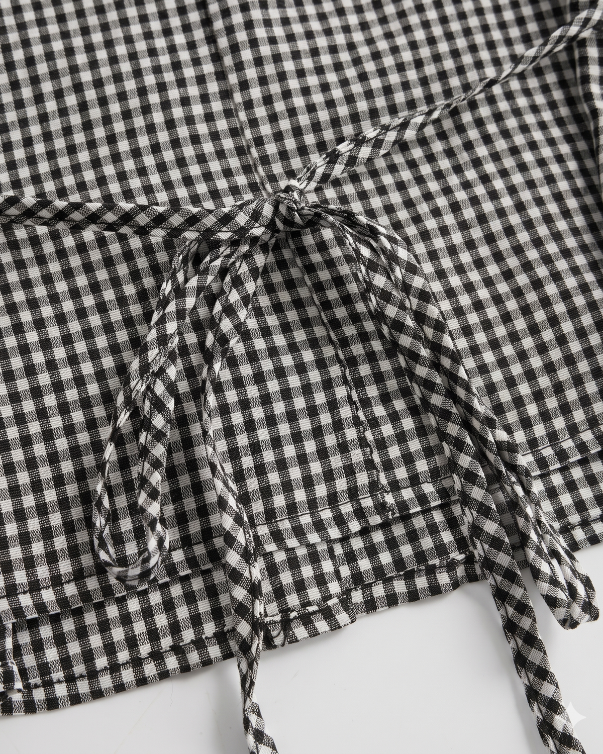 Lace-Trimmed Gingham Tie-Back Peplum Blouse in Black & White