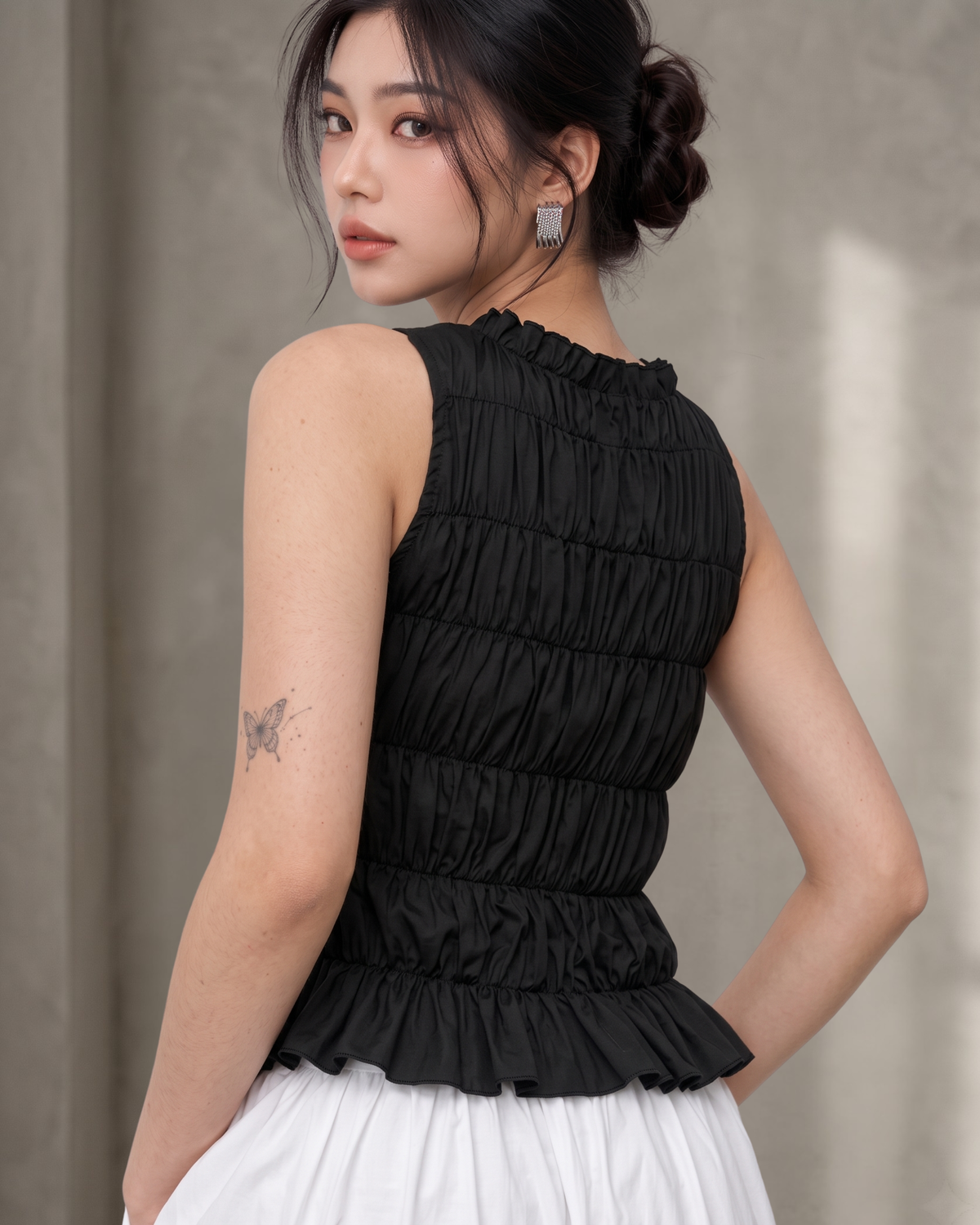 Black Ruffle High-Neck Sleeveless Smocked Peplum Top