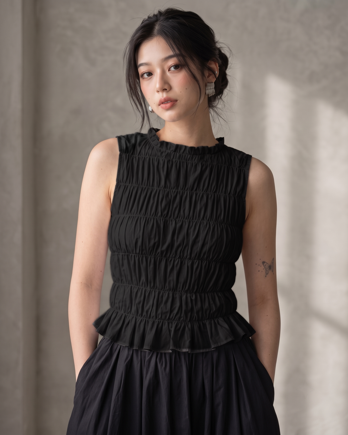 Black Ruffle High-Neck Sleeveless Smocked Peplum Top
