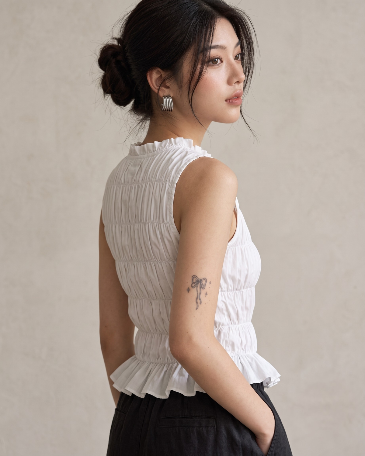 White Ruffle High-Neck Sleeveless Smocked Peplum Top