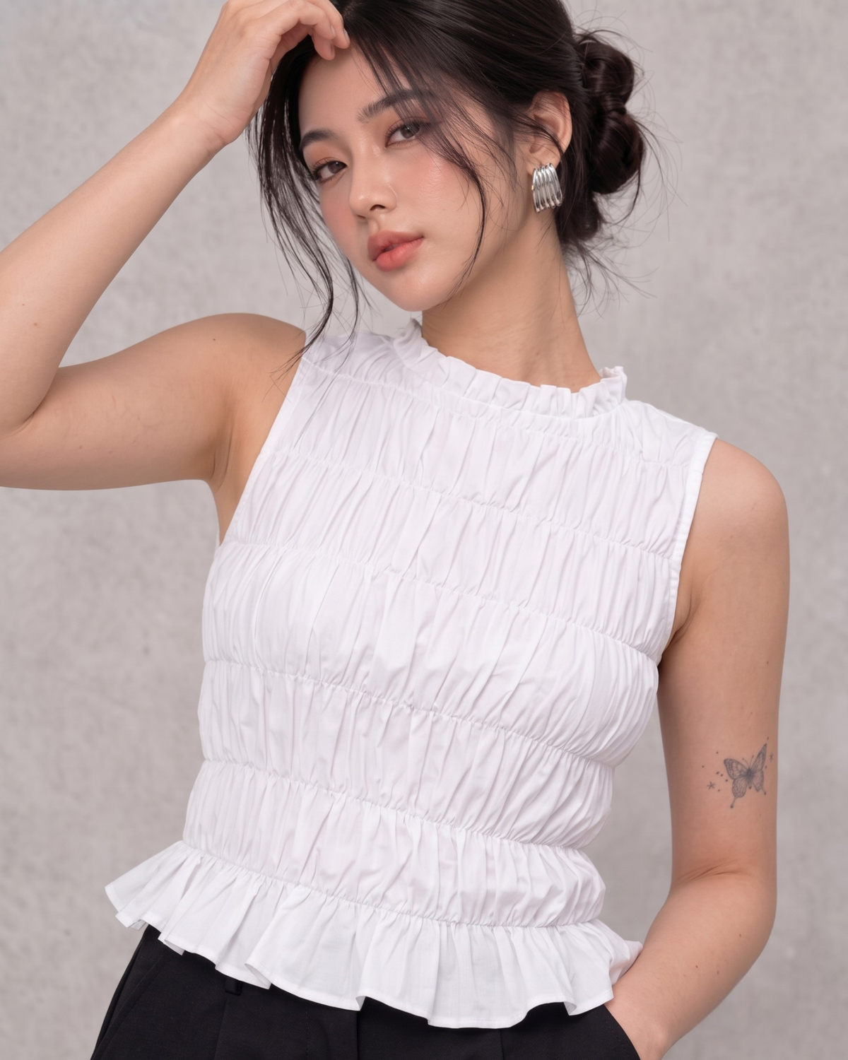 White Ruffle High-Neck Sleeveless Smocked Peplum Top