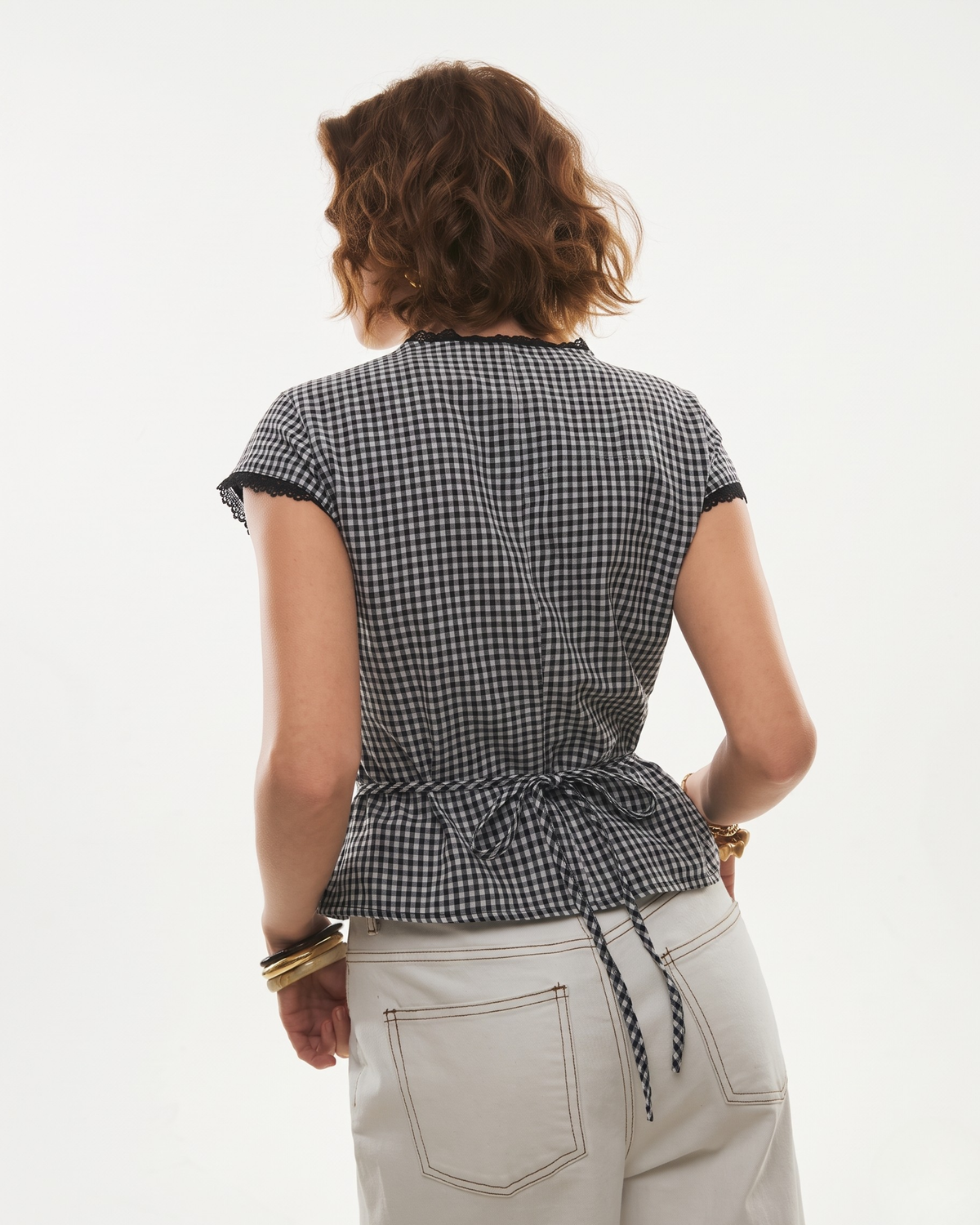 Lace-Trimmed Gingham Tie-Back Peplum Blouse in Black & White