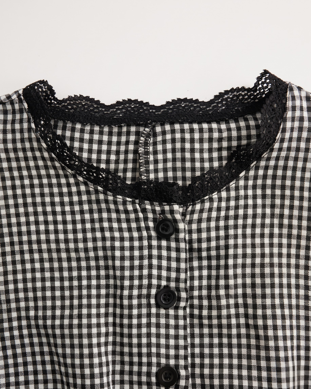 Lace-Trimmed Gingham Tie-Back Peplum Blouse in Black & White